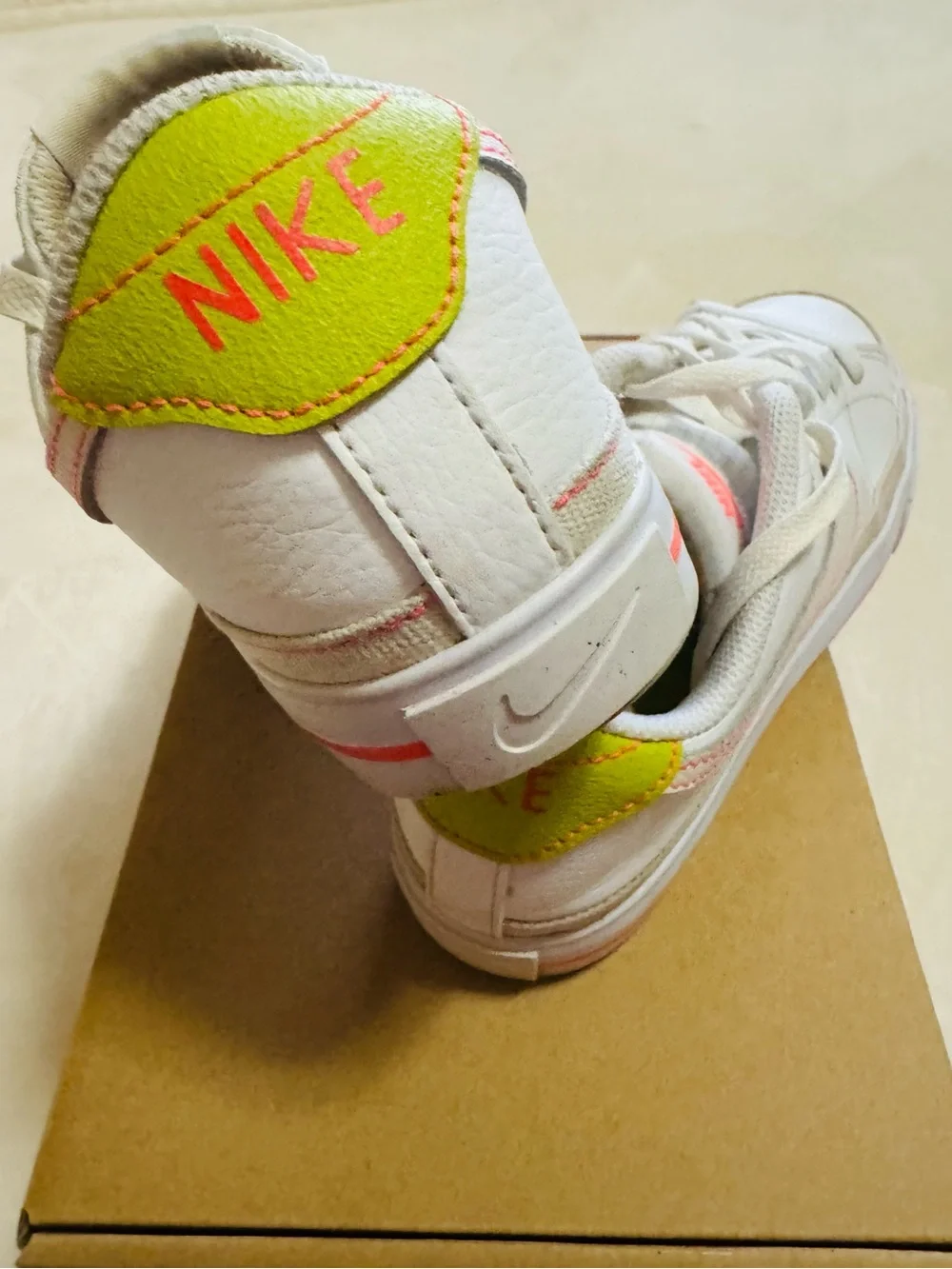 Nike Women's White Sneakers with Pink Accents